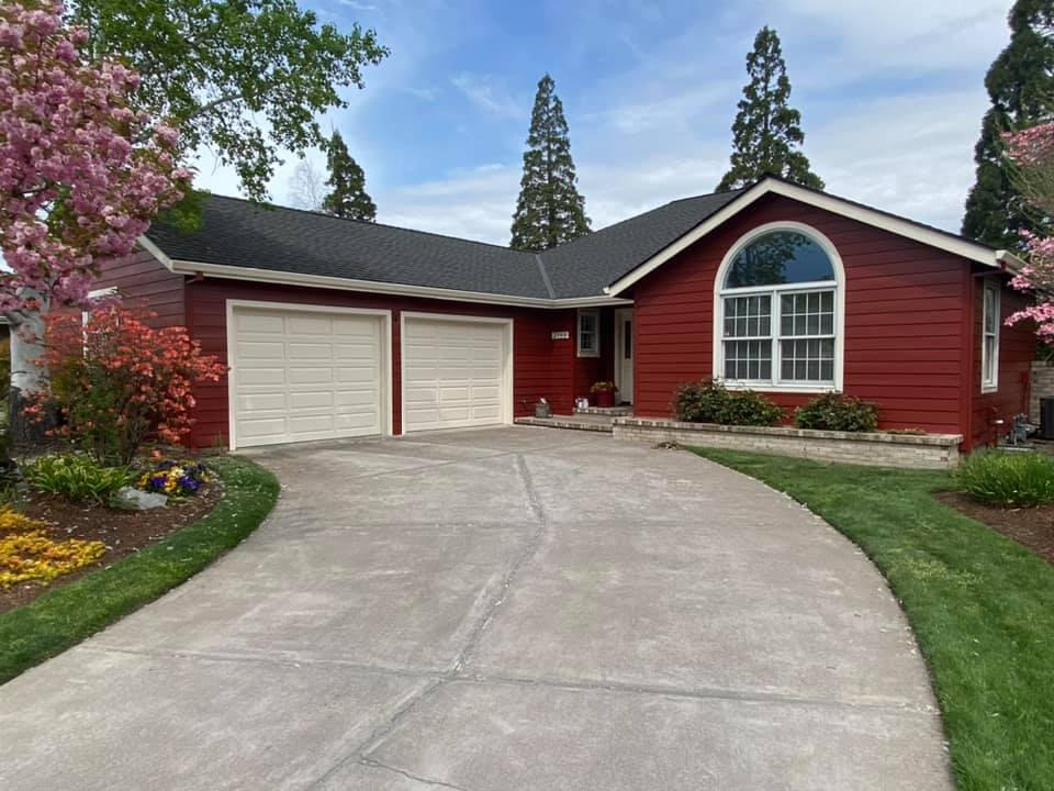 Red residential exterior painting project
